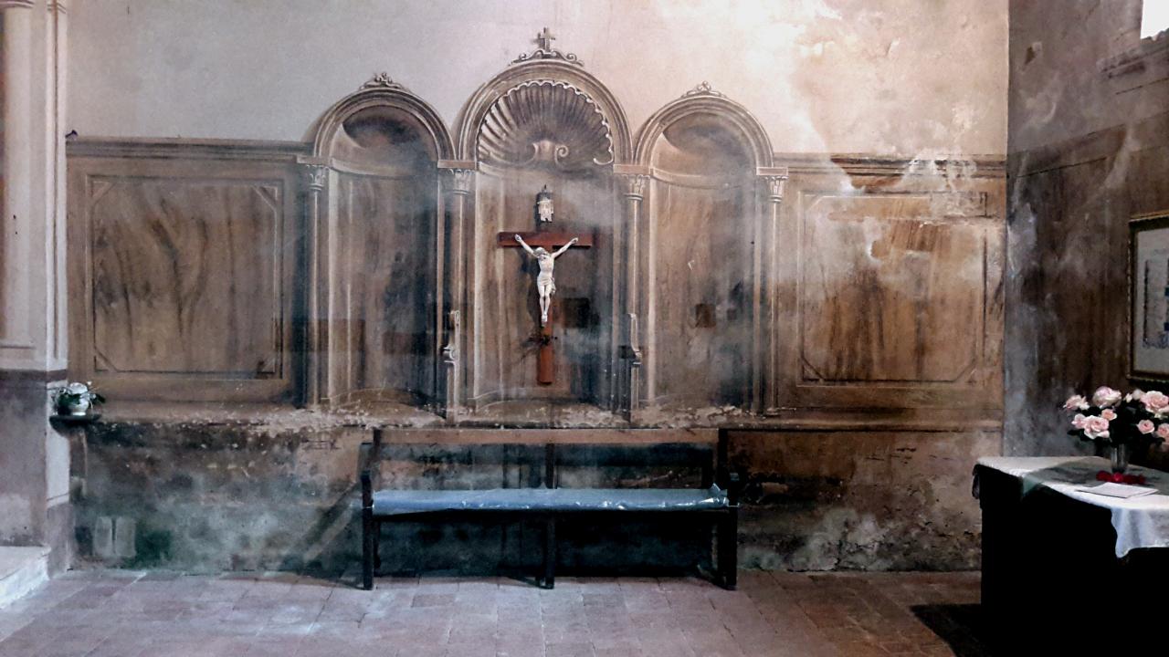 Interior of a Gothic church with crucifix