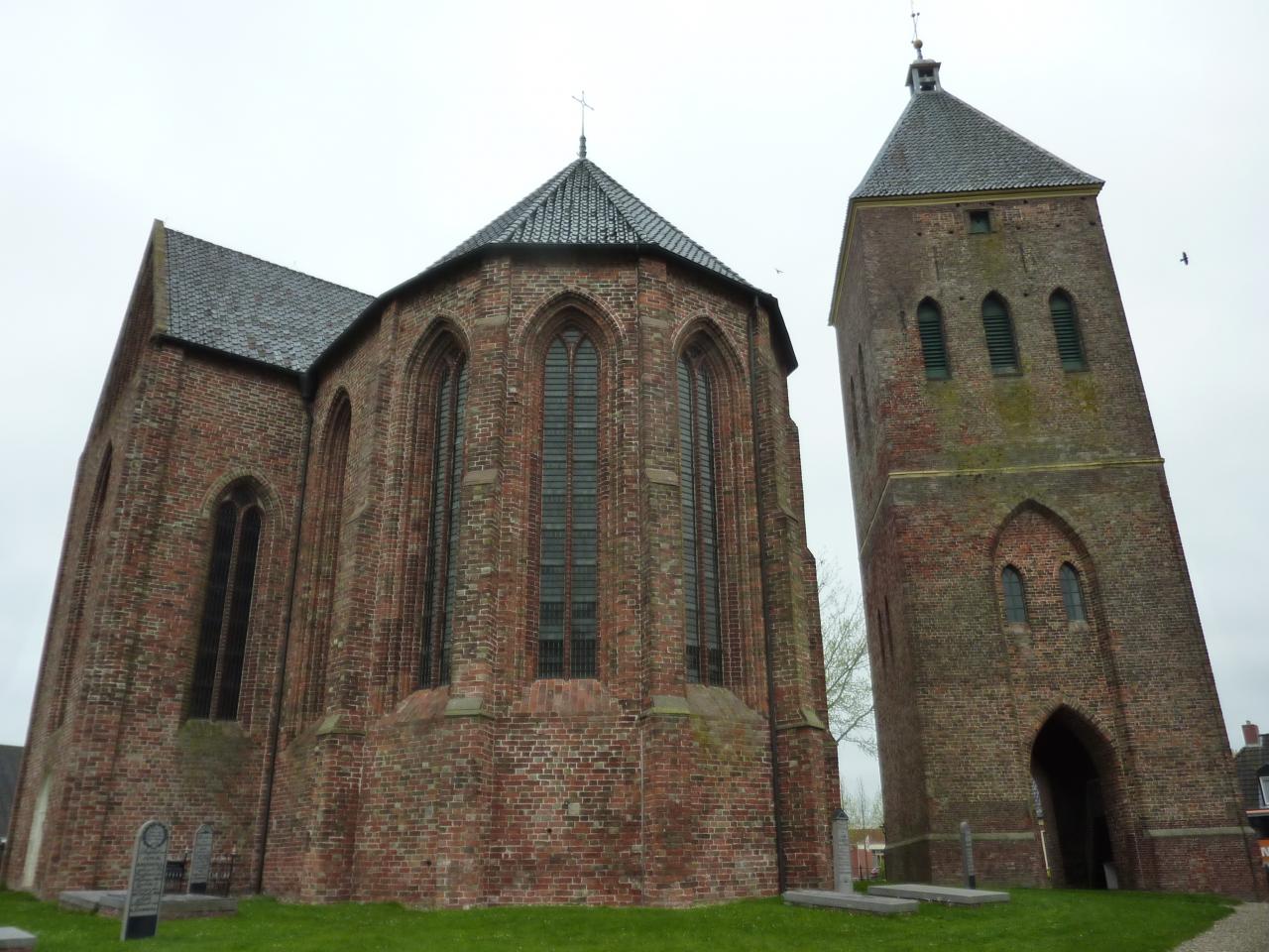14th-century cruciform church and bell tower